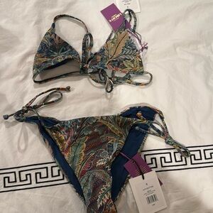 Onia palm print bikinii runs small so I would say petite size small
